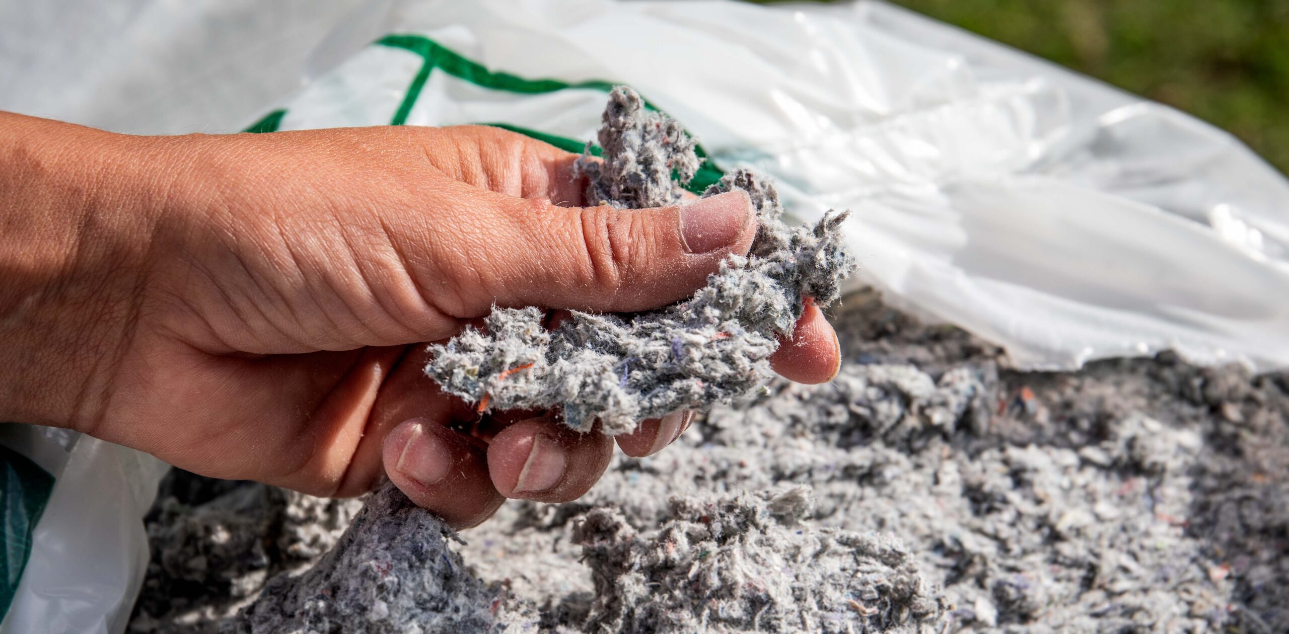 Cellulose insulation for walls and floors In hand